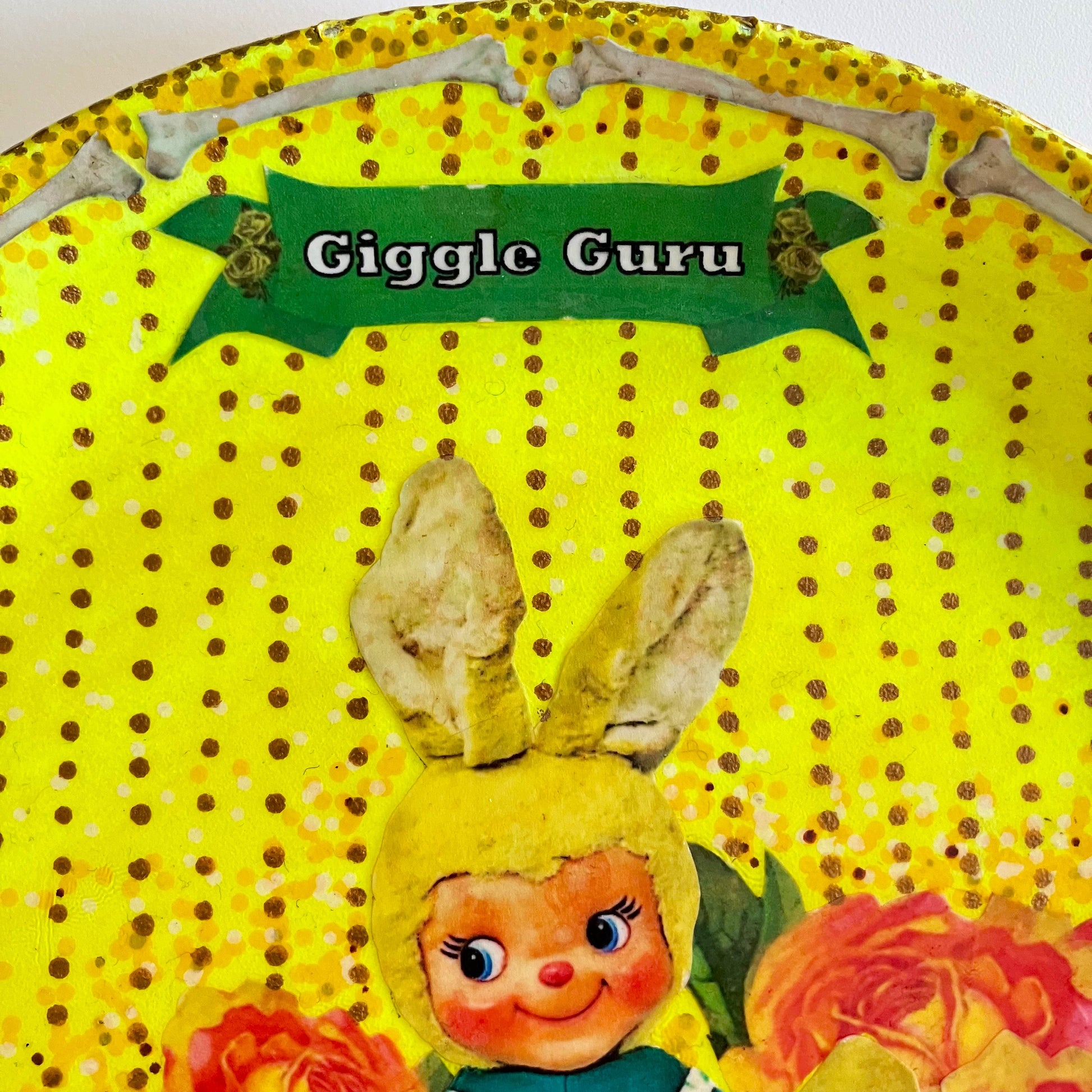 "Giggle Guru" Neon Yellow Wall Plate by House of Frisson, featuring a vintage bunny, roses, bones, and House of Frisson's signature fly. 