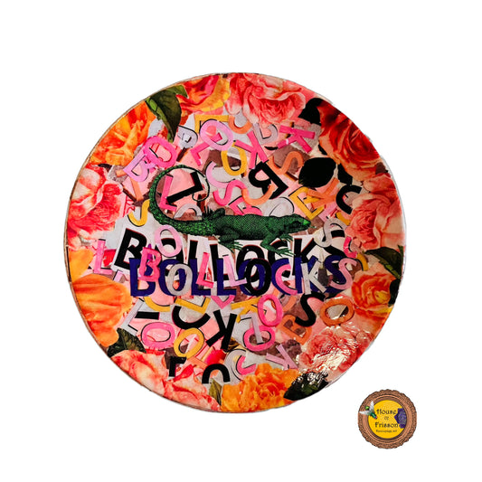 "Bollocks" Wall Plate by House of Frisson, featuring a collage of colourful letters forming the word "bollocks", and a lizard, framed by roses. 