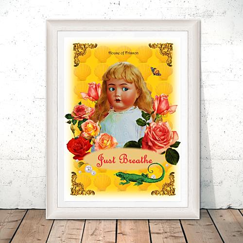 "Just Breathe" A3 Print by House of Frisson, featuring a doll surrounded by roses, pearls, and a lizard, on a yellow background. Showing print in a white frame, resting on the floor.