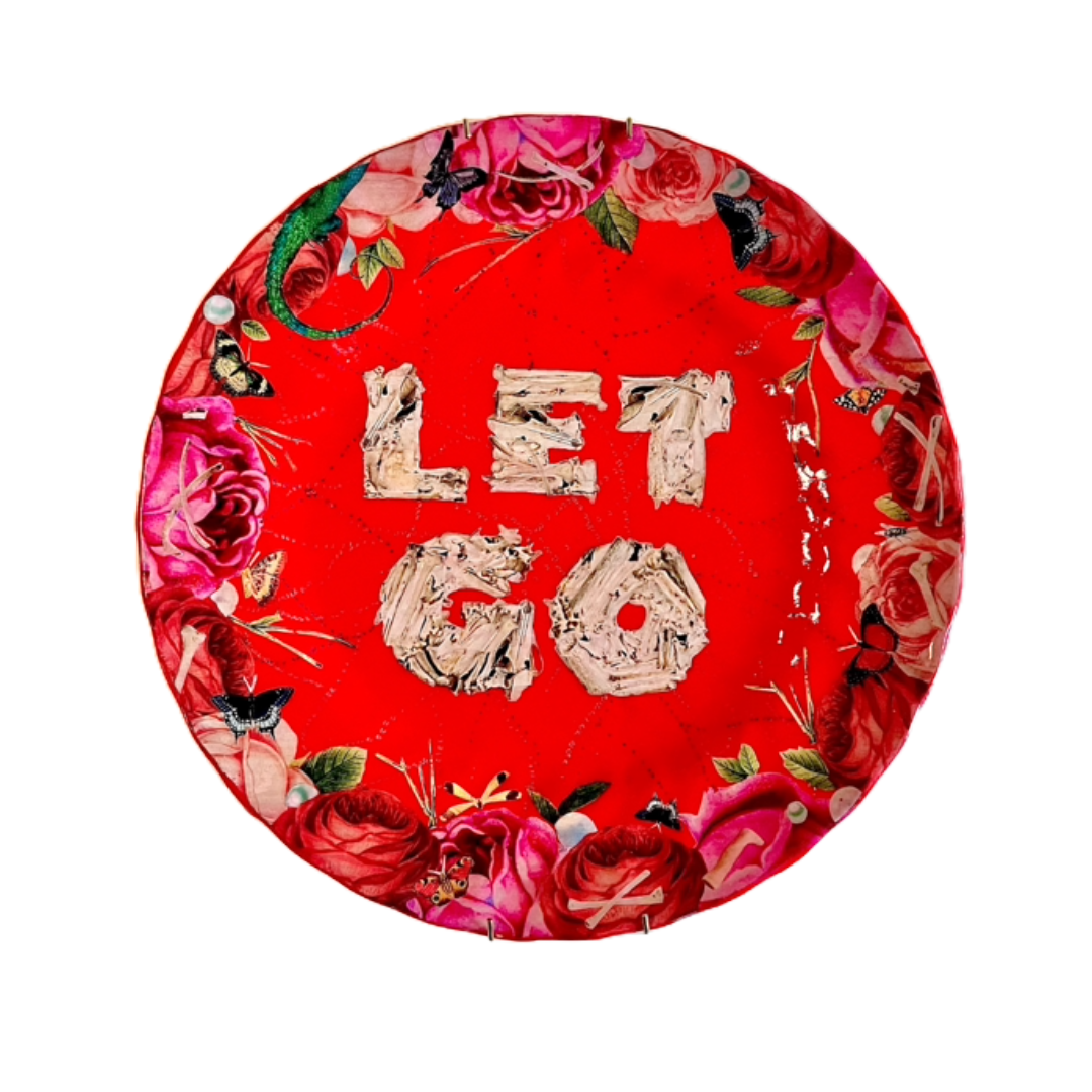 "Let Go" Wall Plate by House of Frisson, featuring a collage artwork of the words "Let Go" written with bones, framed by a collage of roses, moths, pearls, and bones, on a bright red background.