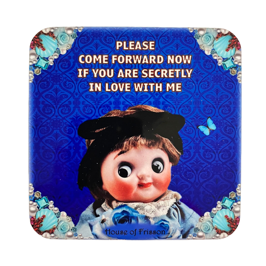 "Please Come Forward Now If You Are Secretly In Love With Me" Coaster by House of Frisson, featuring a vintage doll against a blue background with shells, pearls and roses.