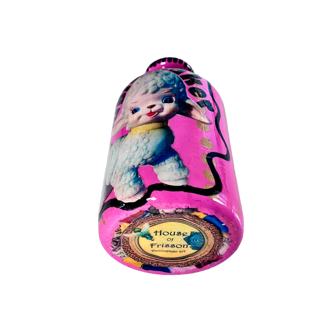 Bright Pink Upcycled Glass Bottle by House of Frisson, featuring an image of a kitsch squeaky lamb toy and some golden dots accent.