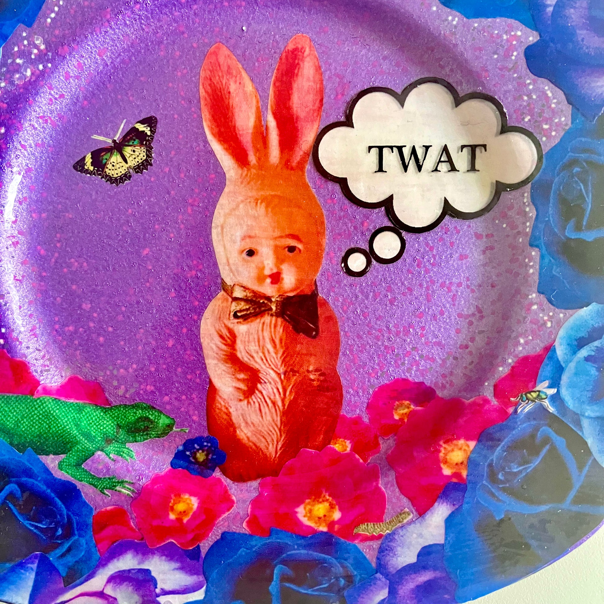 "Twat" Wall Plate by House of Frisson, showing a closeup of the plastic bunny.