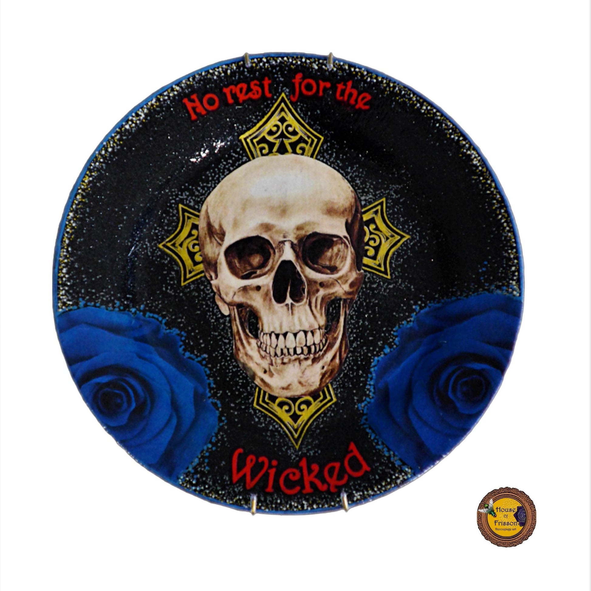 House of Frisson "No Rest For The Wicked" Black Wall Plate front. Collage artwork featuring a skull, a cross, and blue roses, on a black background.